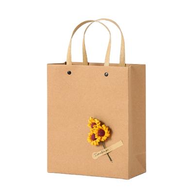 China Handmade Custom Takeaway Kraft Paper Bag Gift Wrapping Clothing Store Portable Packaging Paper Bag for sale