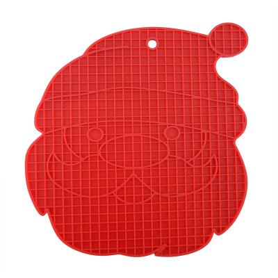 China Modern Universal Easy Gripping Kitchen Utensils Heat Resistant Pad Santa Claus Shaped Silicone Coaster for sale