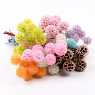 China Environmental protection gift home celebrity decoration small flower windmill green cheap promotional net fruit dry flower for sale