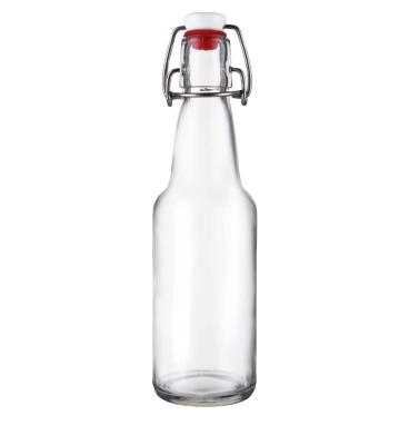 China Eco-friendly 8oz 16oz Clear Glass Bottle With Caps For Juice Water Kombucha for sale