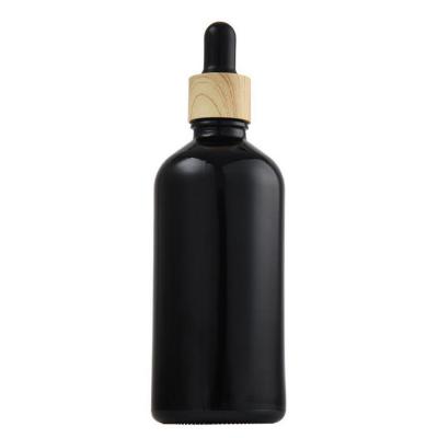 China 10ml 15ml 30ml 50ml 100ml Matte Black Glass Dropper Bottles Eco - Friendly for sale