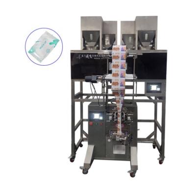 Cina machinery & Material 4 Head Weigher With Granule Vertical Filling Packing Machine 0.5~0.7mpa 0.1m3/min 5-50 bags/min SUS304 450KG in vendita