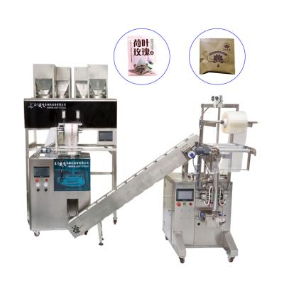 China Food Double Tea Envelope Small Sachet Bag Packing Machine With String And Tag for sale