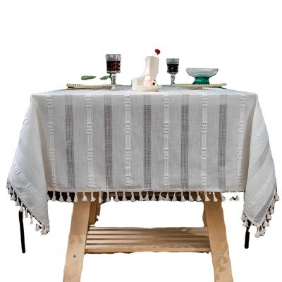 China Solid Color Cloth Office Cavity Pad Embroidered Nordic White Non-slip Linen Dining Table Table Cloth With Tassel for sale