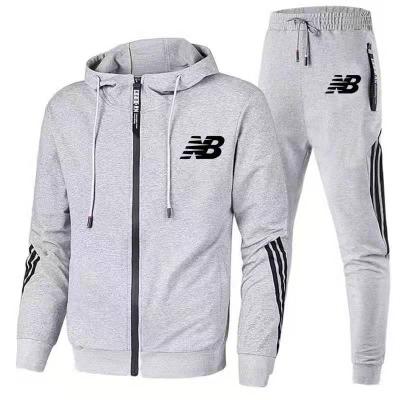 China Spring and autumn men's breathable hooded three bar printed sports leisure suit sportswear tracksuit for sale