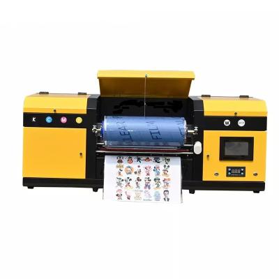 China New Hotels Printing Technology All In One UV Sticker Printer Roll To Roll DTF UV Sticker Printing Machine for sale