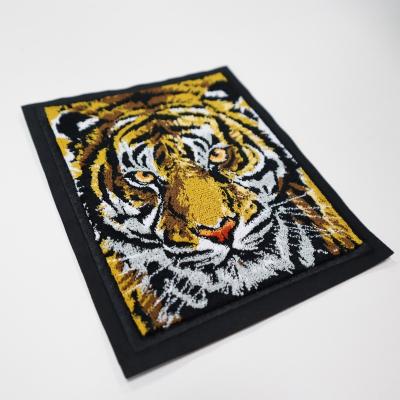 China Toothbrush Embroidery Customized Cartoon Animal Picture Patches Chinese Mascot Tiger Embroidery for sale