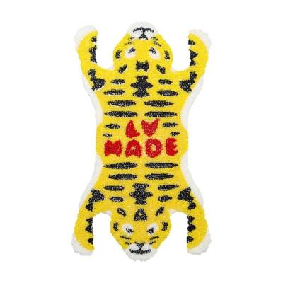 China Fashion Logo China Lie Down Yellow Tiger Toothbrush Embroidery Toothbrush Embroidery Clothing for sale