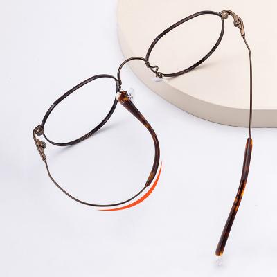 China QICHENG Optical Glasses Shape Eyeglasses Frames Memory Metal Glass Custom Blue Light Blocking Ultra Hard Light Elastic Frame for sale