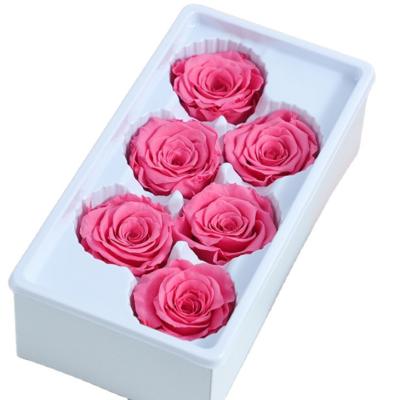 China Beautiful colorful A grade rose immortal flower gift box dry material rose artificial immortal flower head rose for sale