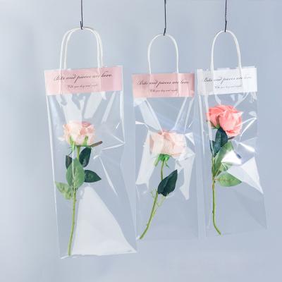 China INS style BIODEGRADABLE factory sale gift package bag fresh flower handle transparent clear plastic plastic bag for sale