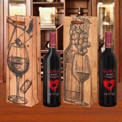 China Recycled Materials Aier High Quality New Design Winery Gift Bag Portable Wine Bottles Paper Bags With Handles for sale