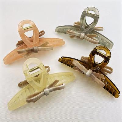 China Hair Accessories Wholesale French Bow Acrylic Hair Clip Hair Claw Clips Large For Thick Ladies Girls Hair Accessories for sale