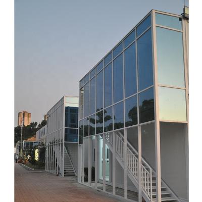 China Modern Porcelain Prefab Flat Container Homes Design 2 Story Modular Office Building With Glass Wall for sale