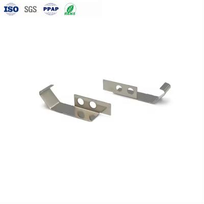 China Partes de estampado de acero inoxidable personalizadas Partes de fundición de metal de alta resistencia para materiales de construcción en venta