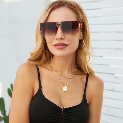 China Women's Large UV Protection Frame Fashion Sun Glasses Sunglasses for Men Fashion Diamond Rimmed Rimless Glasses for sale