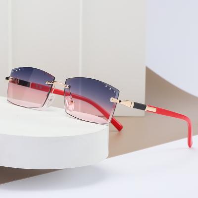 China New Fashion Sunglasses 2022 Fashion Sunglasses Women Rimless Ocean Slice Diamond Balanced Small Frame Sunglasses for sale