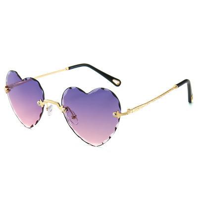 China Fashion Sunglasses Heart Peach Love Shape Gradient Shading Ladies Sun Glasses Rimless Shaped Sunglasses 2022 Custom Fashionable Women Shape Sunglasses for sale