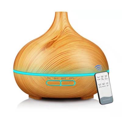 China Home Bedroom Air Purifying Essential Oil Diffuser Humidifier 550ml Household Grain Remote Wood Aromatherapy Machine for sale