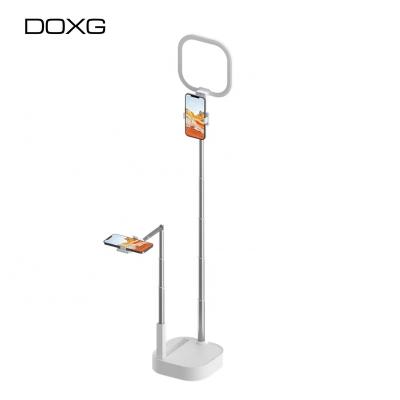 China DOXG Live Stream Tripod LED Mini Portable Foldable Wireless Selfie Fill Circle Light Phone Holder with Light for sale