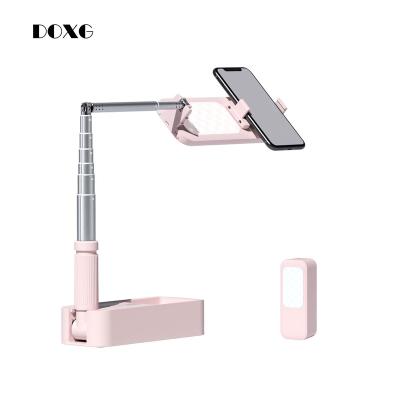 China DOXG mini new design ring light phone cases and retractable photographic light phone holder, led light lingerie for sale