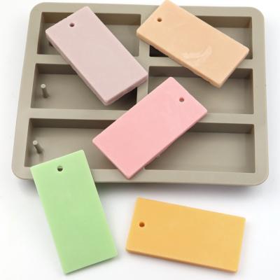 China 772 disposable ready in shipping 6 hole shape factory stock 6 square gypsum aromatherapy tablet siliconecandle molds cakemold for sale