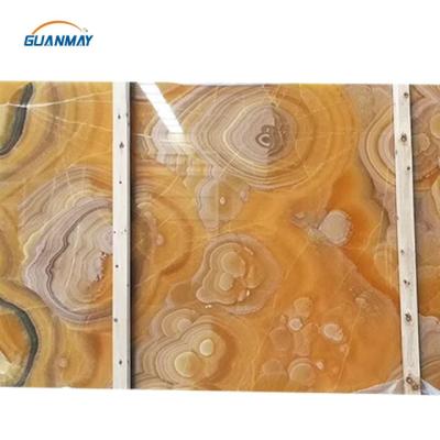 China Modern LED Honey Onyx Natural Light Up Light Marble Compound Yellow Onyx Slab for sale