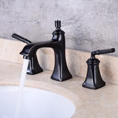 China Contemporary delta faucet for lavatory fancy black hole 3 handle basin faucet S79-015 grifo basin double deck mounted bathroom basin faucet for sale