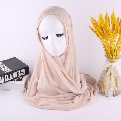 China 2021 soft and comfortable wholesale muslim tudung tank top cotton tubes cross scarf striped pure color women head wrap shawl hijab for sale