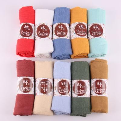 China Low price factory promotion 105colors classic muslim scarf fringed shawl cotton fold cotton squishy soft feeling hijab for sale