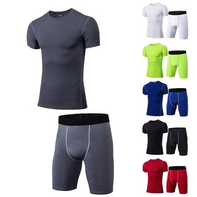 China Wholesale Mens Breathable Workout Sets High Elastic Compression Shirt Set Fitness Quick Dry Gym Tracksuits For Men for sale