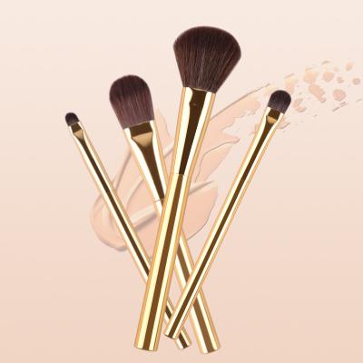 China Angular Blush New Arrival 4pcs Fashion Shiny Gold Aluminum Handle Synthetic Stiffens Small Makeup Brush Set for sale