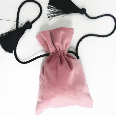 China Recyclable High Quality Jewelry Plush Velvet Bag Cosmetic Pouch With Long Tassel for sale