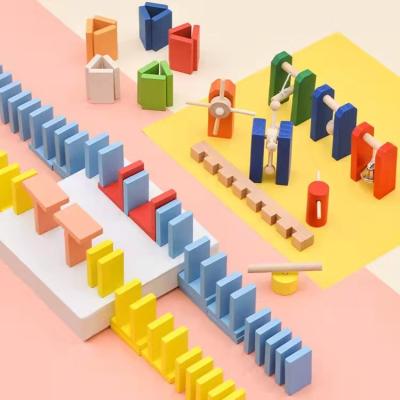 China Fashionable wholesale custom made wooden rectangle domino colorful mini game set for sale