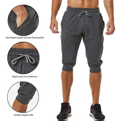 China 2021 Mens Joggers 3/4 Pants Breathable Slim Fit Training Pants Workout Gym Shorts With Zipper Pocket for sale