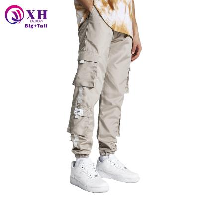 China Factory direct polyester multifunctional cargo men's street plus size casual pocket pants men's pants and trousers for sale