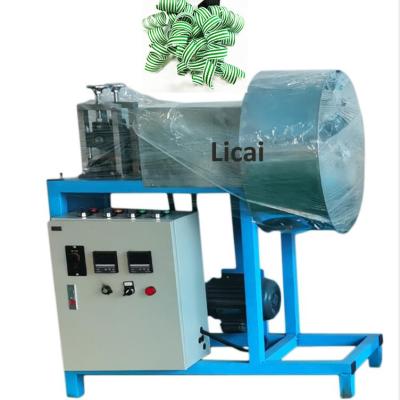 China Textiles Woven Fabric Curly Satin Ribbon Bow Making Machine Flower Bow Roll Up Machinery for sale