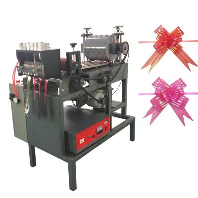 China Automatic Red Satin Ribbon Pull Bow Machine Organza Pull Bow Making Machine for sale