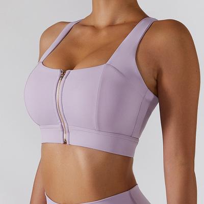 China Factory Custom Sexy Breathable Gym Women Running Workout Fitness Yoga Training Crop Tops Front Zipper Crossed Back Yoga Sports Bra for sale