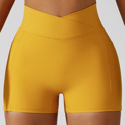 China Hot Sale Girl's Breathable Stretch Rib Fabric High Waist Gym Pants Women Butt Lift Sports Shorts Yoga Shorts With Pockets for sale