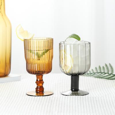 China Hot Sale Vertical Stripes Vase Glass Bottle Flower Vase Decoration Transitional Colored Glass Wine Glass For Party Gift for sale