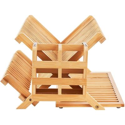 China Sustainable Foldable Bamboo Dish Rack Cross Dish Drainer With Cutlery Basket for sale