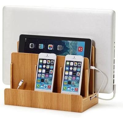 China Remote Control Phone Wooden Bamboo Charging Station For Multiple Devices And Tablet With Watch Holder for sale