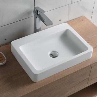 China Easy Clean Ceramic Countertop Bathroom Sink Counter Top Table Solid Outdoor Hand Wash Sink for sale