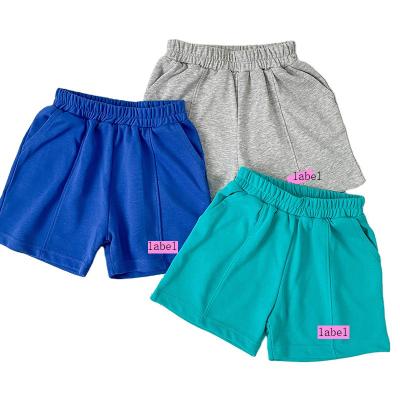 China Factory wholesale price kids cotton fabric anti-pilling shorts casual children's shorts boys solid color sports standard five-point pants for sale