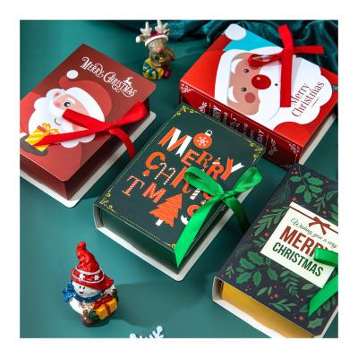 China New Recycled Materials Christmas Candy Box Gift Box Carton Book Series Creative Magical Christmas Candy Box Wholesale for sale