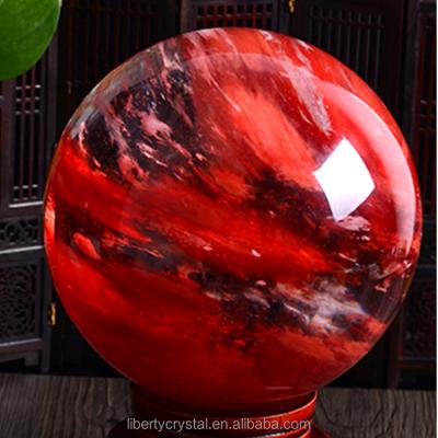 China Wholesale High Quality Red Smelting Stone Quartz Crystal Ball For Decoration from China for sale