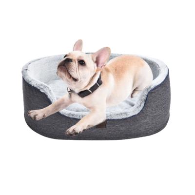 China Travel Heating Soft Round Pet Beds Comfortable Soothing Dog Beds With Oxford Water Resistant Bottom for sale