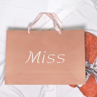 China Recyclable Luxury Colorful Printing Paper Shopping Bag With Printing Logo Kraft Paper Packaging Gift Bag With Satin Rope Handle for sale