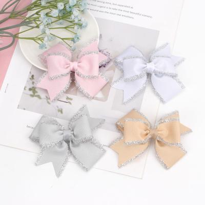 China Headwear Soft Glitter 4 Inch Girls Solid Grosgrain Ribbon Hair Bows With Clip Boutique Handmade Hair Clips For Kids for sale